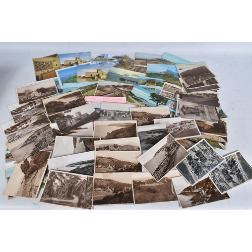 334 - POSTCARDS, a tray containing postcards to various towns and villages in the South-West of England, a... 