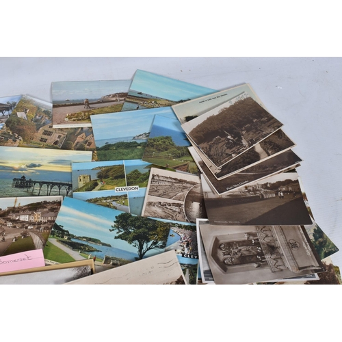 334 - POSTCARDS, a tray containing postcards to various towns and villages in the South-West of England, a... 