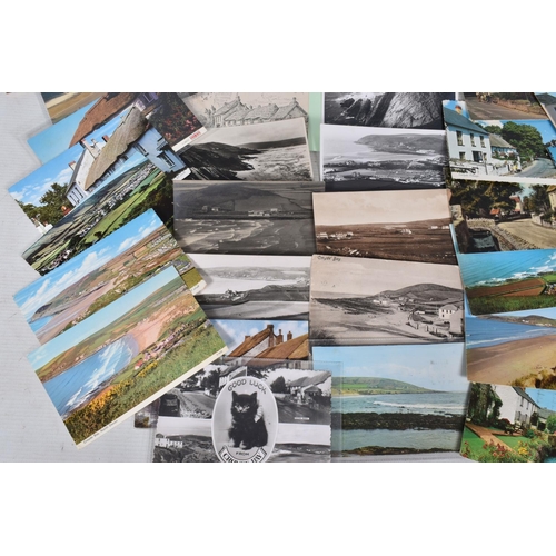 335 - POSTCARDS, a tray containing postcards to various towns and villages in the South-West of England, a... 