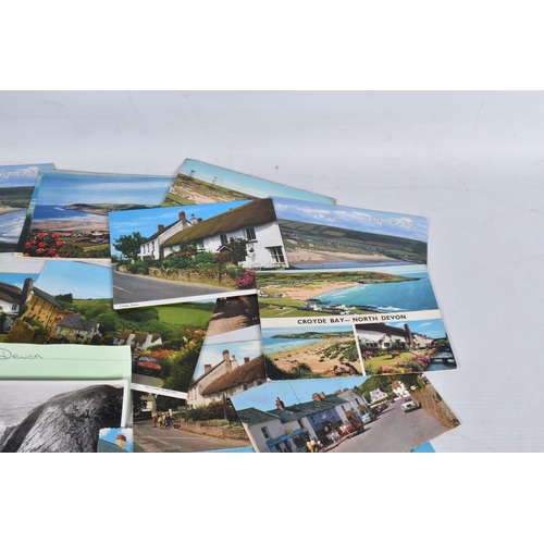 335 - POSTCARDS, a tray containing postcards to various towns and villages in the South-West of England, a... 