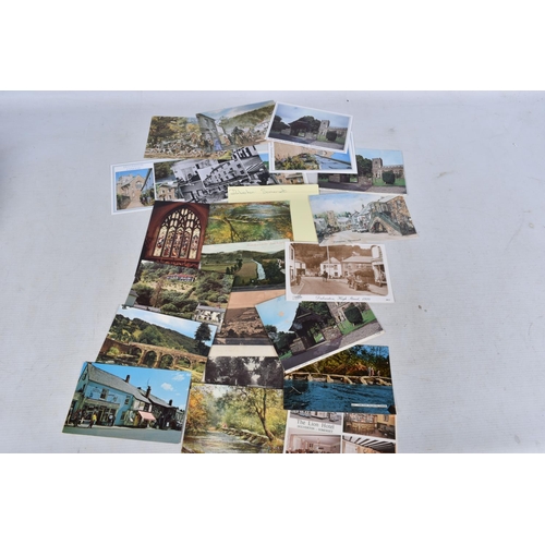 335 - POSTCARDS, a tray containing postcards to various towns and villages in the South-West of England, a... 