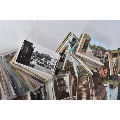 337 - POSTCARDS, a tray containing postcards to various towns and villages in the South-West of England, a... 