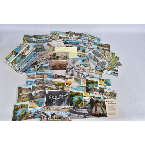 337 - POSTCARDS, a tray containing postcards to various towns and villages in the South-West of England, a... 