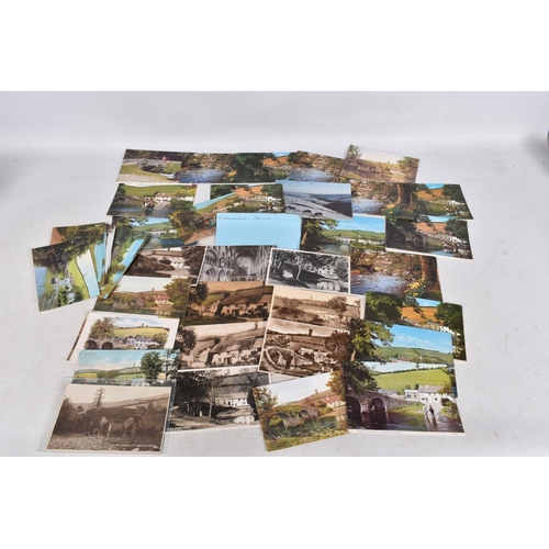 344 - POSTCARDS, a tray containing postcards to various towns and villages in the South-West of England, a... 