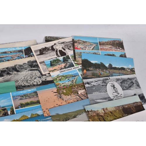 346 - POSTCARDS, a tray containing postcards to various towns and villages in the South-West of England, a... 