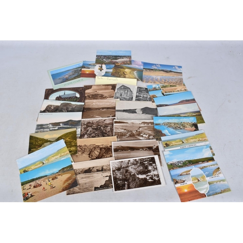 348 - POSTCARDS, a tray containing postcards to various towns and villages in the South-West of England, a... 