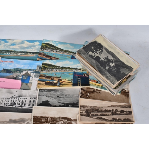 351 - POSTCARDS, a tray containing postcards to various towns and villages in the South-West of England, a... 