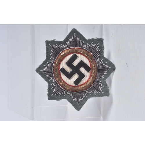 278 - A NAZI GERMANY THIRD REICH GOLD WAR MERIT CROSS, this is the cloth version and features the gold wre... 