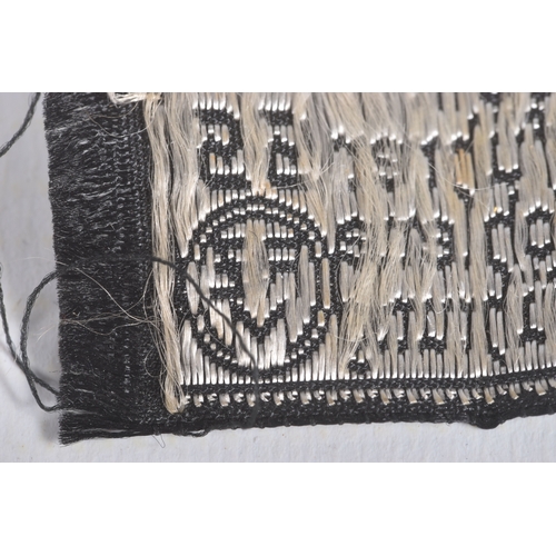 230 - A THIRD REICH GERMAN SS OFFICERS COLLAR PATCH, this is black and silver and was worn by a soldier wi... 