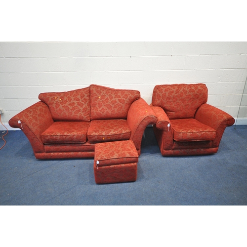 1394 - A RED UPHOLSTERED THREE PIECE LOUNGE SUITE, comprising a two seater settee, length 191cm, armchair a... 