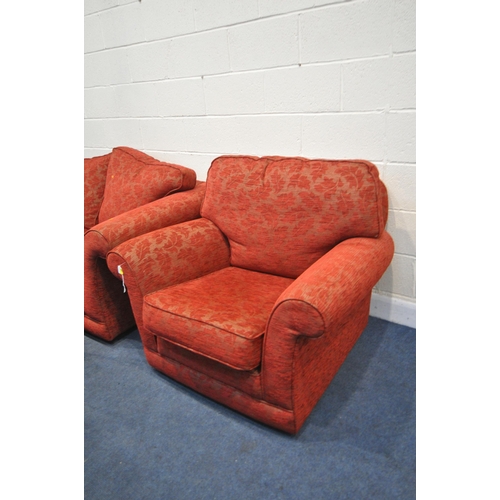 1394 - A RED UPHOLSTERED THREE PIECE LOUNGE SUITE, comprising a two seater settee, length 191cm, armchair a... 