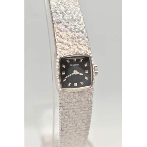 108 - A 9CT WHITE GOLD LADYS 'LONGINES' WRISTWATCH, manual wind, square black dial signed 'Longines', bato... 