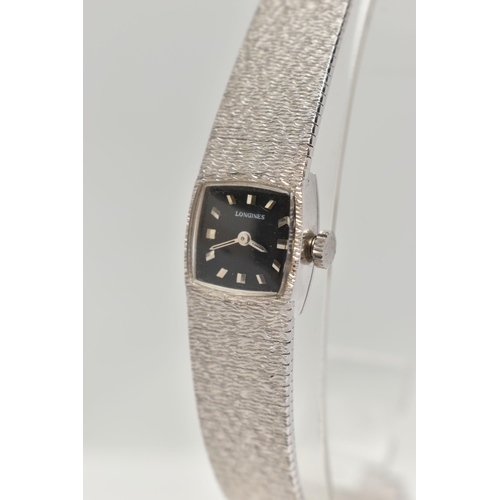 108 - A 9CT WHITE GOLD LADYS 'LONGINES' WRISTWATCH, manual wind, square black dial signed 'Longines', bato... 