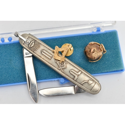 110 - THREE ITEMS OF MASONIC REGALIA, to include a gold plated masonic folding ball pendant, stamped 'Made... 