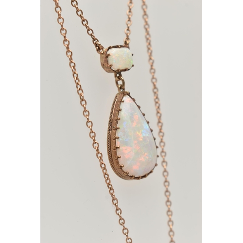 113 - AN OPAL PENDANT NECKLACE, pear cut opal cabochon measuring approximately 22.3mm x 14.4mm, claw set b... 