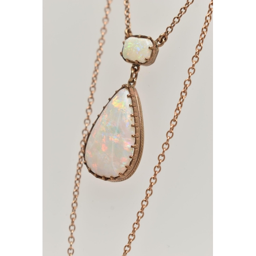 113 - AN OPAL PENDANT NECKLACE, pear cut opal cabochon measuring approximately 22.3mm x 14.4mm, claw set b... 