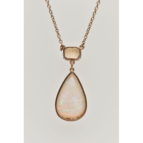 113 - AN OPAL PENDANT NECKLACE, pear cut opal cabochon measuring approximately 22.3mm x 14.4mm, claw set b... 