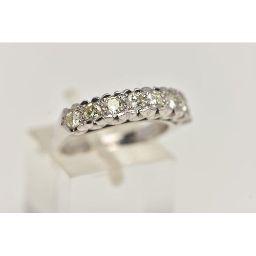 119 - AN 18CT GOLD DIAMOND RING, designed as a row of eight round brilliant cut diamonds, total estimated ... 