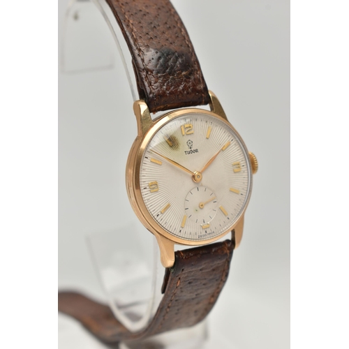 144 - A 9CT GOLD 'TUDOR' WRISTWATCH, hand wound movement, round dial signed 'Tudor', Arabic numerals at th... 