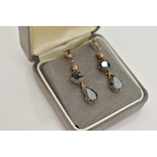 167 - TWO PAIRS OF DROP EARRINGS, the first designed as a pear cut and a circular cut hematite drop, claw ... 