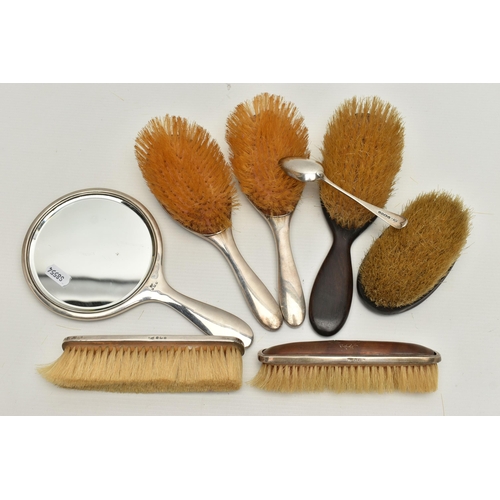 205 - A SILVER AND IMITATION TORTOISESHELL DRESSING TABLE SET ETC., including four hair brushes and a hand... 