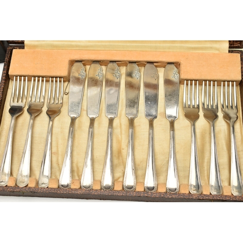 216 - A 'BESTECKE SOLINGEN' CUTLERY SET AND OTHER CUTLERLY ITEMS, a black brief case encasing a twelve pla... 