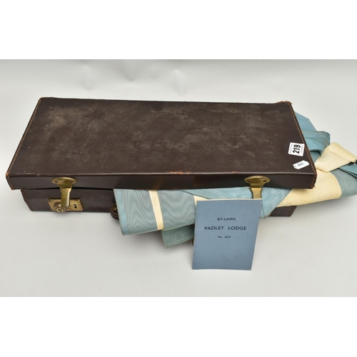 219 - A MASONIC APRON, CALENDER AND PAPERS, all encased in a brown breif case