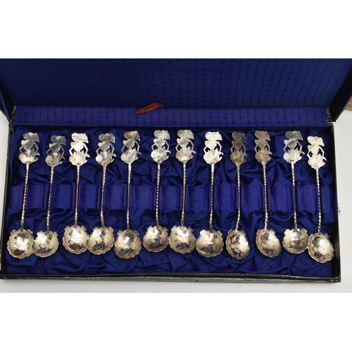 220 - A CASED SET OF COFFEE SPOONS AND TWO CANTEENS, twelve continental coffee spoons, each stamped 800, a... 