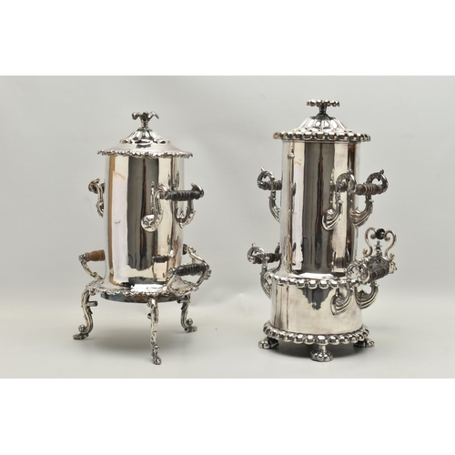 224 - TWO SILVER PLATE SAMOVAR, the first a samovar decorated with four acanthus leaf and carved ebony han... 