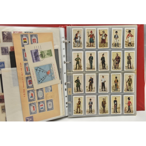 227 - TWO ALBUMS OF COINS, STAMPS, BANKNOTES, ETC, to include an album 1 Four Sheets of WWII Related coina... 