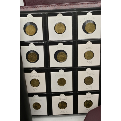 232 - A BOX OF WORLD COINS CONTAINED IN Eight x  Coin Folders/Albums Containing Quite Modern World Coinage... 