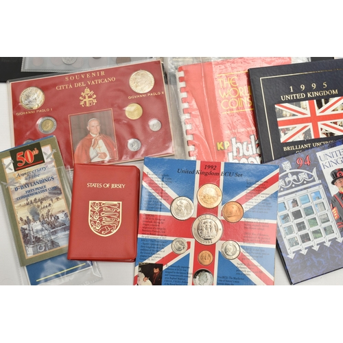 234 - FOUR SMALL ALBUMS CONTAINING COINS AND BANKNOTES, to include Early Ten and One Pound banknotes some ... 