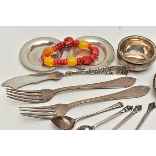 237 - SILVER AND WHITE METAL ITEMS WITH A BRACELET, to include a silver tea strainer with dish, hallmarked... 