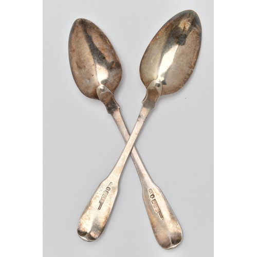 240 - TWO GEORGIAN SILVER BASTING SPOONS, fiddle pattern spoons with engraved crests to the handle termina... 