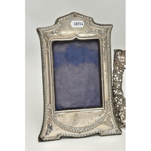 245 - A SILVER MOUNTED FRAME AND SILVER FRAME MOUNT, the Edwardian silver frame with embossed swag and rib... 