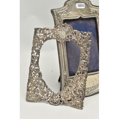 245 - A SILVER MOUNTED FRAME AND SILVER FRAME MOUNT, the Edwardian silver frame with embossed swag and rib... 