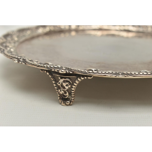 246 - A VICTORIAN SILVER SALVER WITH A WAVY, BEADED, PIERCED AND FOLIATE CAST BORDER, worn foliate engrave... 