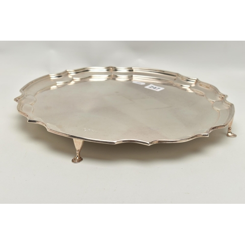 247 - AN ELIZABETH II SILVER SALVER, circular salver with a scroll border, hallmarked 'Francis Howard Ltd'... 