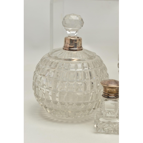 251 - FOURTEEN LATE 19TH AND EARLY 20TH CENTURY SILVER MOUNTED SCENT BOTTLES, various shapes and sizes inc... 