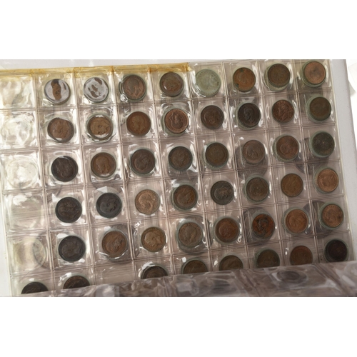 253 - A BOX CONTAINING TWO ALBUMS OF BRITISH COINS, A LINDNER TRAY OF MAINLY WORLD COINS OF WHICH ARE SEVE... 