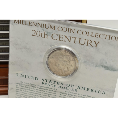 254 - A FRANKLIN MINT MILLENNIUM COIN COLLECTION, to include first century to twentieth century coinage ho... 