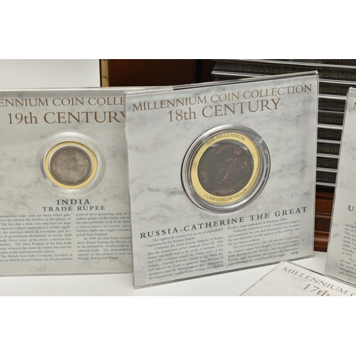 254 - A FRANKLIN MINT MILLENNIUM COIN COLLECTION, to include first century to twentieth century coinage ho... 