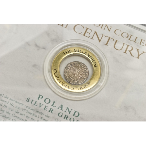 254 - A FRANKLIN MINT MILLENNIUM COIN COLLECTION, to include first century to twentieth century coinage ho... 