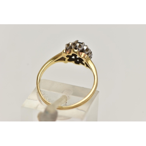 256 - AN 18CT GOLD SAPPHIRE AND DIAMOND CLUSTER RING, of a circular form, set with a central circular cut ... 