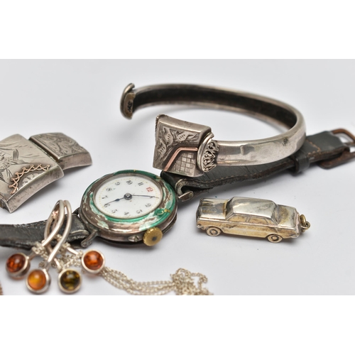 262 - FIVE ITEMS OF JEWELLERY, to include an Edwardian silver enamel watch head, import mark for London 19... 