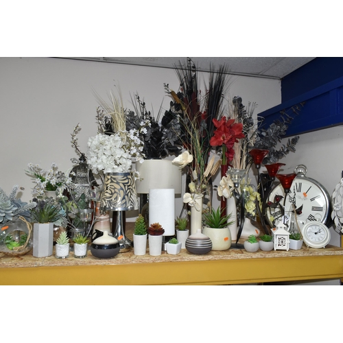 351 - A LARGE QUANTITY OF FAUX FLOWERS, LAMPS AND MODERN WALL CLOCKS, comprising three table lamps, three ... 