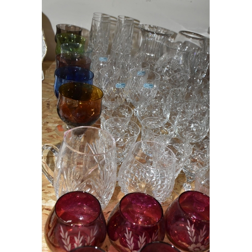 355 - A QUANTITY OF CUT CRYSTAL AND COLOURED GLASSWARE, comprising a Royal Brierly perfume atomizer, clare... 