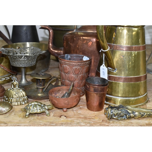 365 - A GROUP OF METAL WARES, to include two brass jam kettles, a brass saucepan, a copper beaker decorate... 