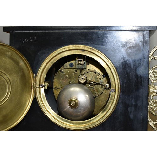 366 - TWO BLACK SLATE AND MARBLE MANTEL CLOCKS, one having an ornate finial, foliate decoration, and black... 