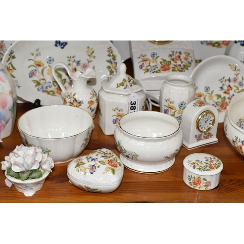 381 - A COLLECTION OF AYNSLEY GIFTWARES, in mainly Cottage Garden pattern, to include a wall clock, two fr... 